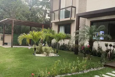 Image de Beautiful house in Praia do Forte Bahia! It has a volleyball court and games room!