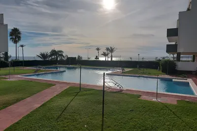 Image de Appartement de vacances Casa Conchita avec vue sur la mer, piscine partagée et Wi-Fi.