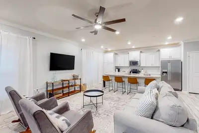 Beautiful & open home with enclosed porch, game room, W/D - beach & pool access