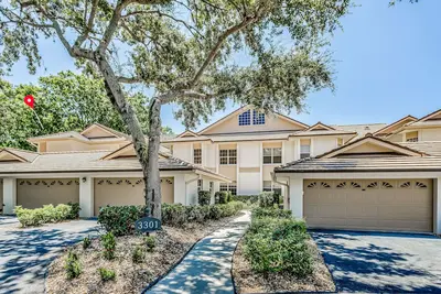 Image de Ground-floor condo on the golf course with decks, pools & Ac - snowbird-friendly