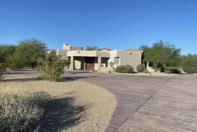 Custom home which boasts spectacular views of the Estrella Mountains