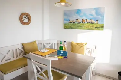 Image de Nordland Appartments - Apartment Pellworm - Directly by the sea, you can't get any closer!