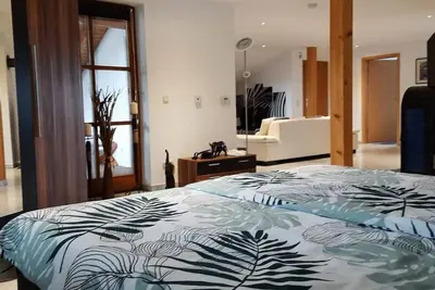 Image de Cozy vacation apartment (75sqm) with wood-burning stove and balcony