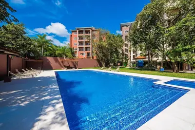 Image de Convenient condo with 2 pool areas and gym -  A few steps of Playa Langosta