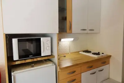 Image de 50m du centre station, Rez-de-chaussée, balcon, parking, télévision, casier à ski, 28m², Les 2 Alpes