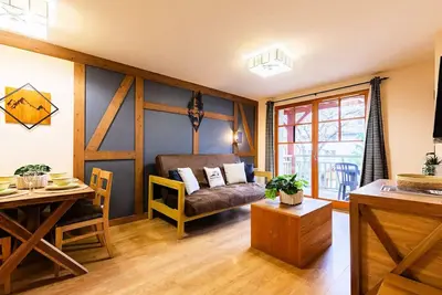 Image de Appartement centre-ville avec piscine et sauna