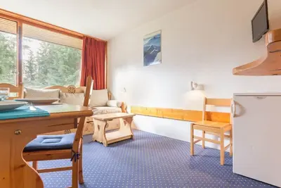 Image de Studio cabine pied des pistes avec balcon et cuisine équipée