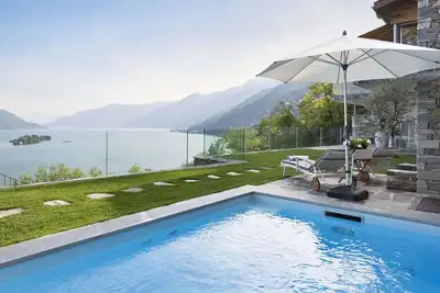 Image de Bel appartement dans une maison de vacances avec internet, piscine, patio, vue panoramique, parking