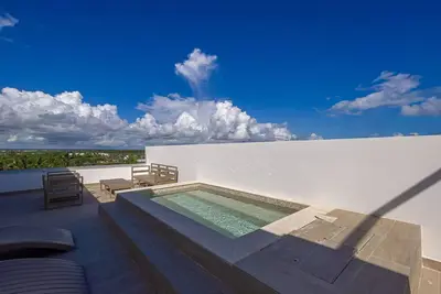 Image de Penthouse de plage avec barbecue et Picuzzi - Tga5