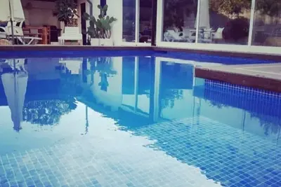Image de Great vacation home close to the beach with private, heated pool