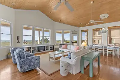 Image de Oceanfront home with wraparound porch, WiFi, Ac, W/D, & beach access