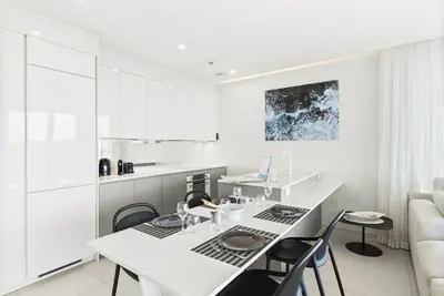 Image de Incroyable appartement 1 chambre avec vue spectaculaire sur la plage de Mullet Bay et le parcours de golf