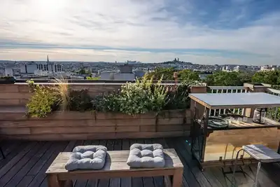 Image de Beautiful & unique view of Paris from a big terrace, Loft by the Buttes Chaumont