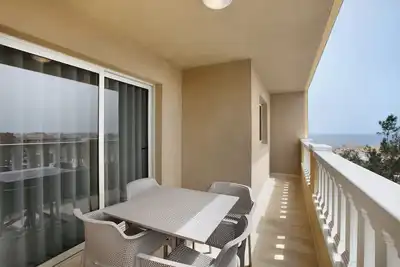 Image de Appartement de vacances 'La Perla E35 En El Médano' avec piscine partagée, balcon et Wi-Fi