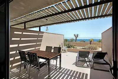 Image de Appartement de vacances 'Casa Médano 5 En El Médano' avec vue sur la mer, terrasse privée et Wi-Fi