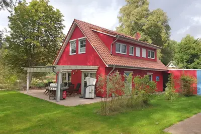 Image de ~ Color magic red in Conneforde ~ with large terrace, garden, sauna,