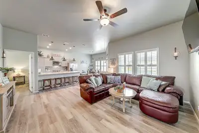 Image de Newly built home with a bay view, inviting deck & on-site pool