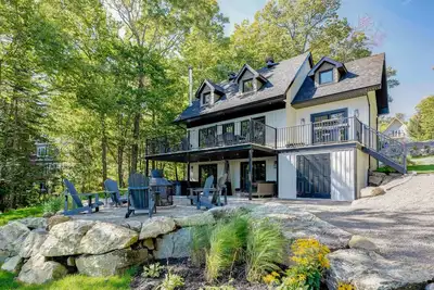 Image de Magnifique chalet au bord de l’eau avec spa et plage privée (Lac de l’Achigan)