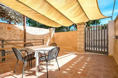 Image de Appartement Acquadolce accueillant pour les animaux de compagnie, avec vue sur la mer et terrasse