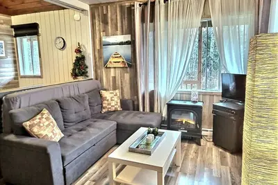 Image de Chalet Alison escapade en couple au bord de l'eau avec spa