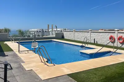Image de Appartement \"Cucurrox\" avec vue sur la mer, piscine partagée et Wi-Fi.