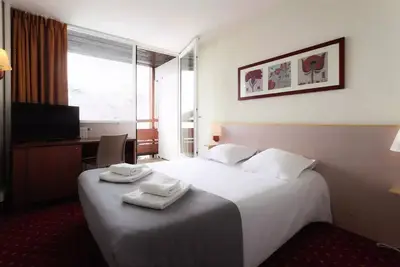 Image de 2 Chambres Essentiel 2 Adultes et 3 Enfants avec Balcon et Vue Imprenable Montagne