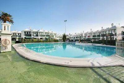 Image de Maison de vacances Dunaflor Gemelo 2 avec piscine partagée, terrasse et Wi-Fi