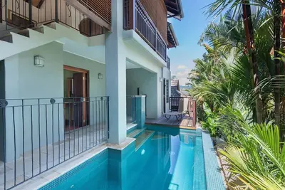 Image de Coco Villa Central Mediterranean style Pool Oasis