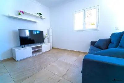 Image de Appartement d’une chambre avec grand salon dans un complexe de vacances.