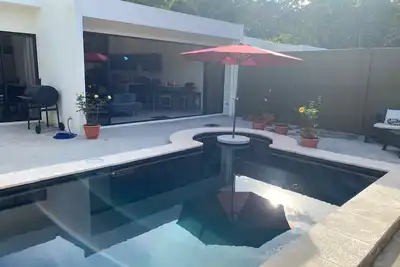 luxury modern home with pool 25mi from the beach.