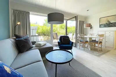 Image de Ferienwohnung mit Hund und Terrasse