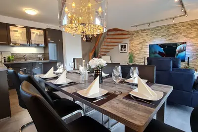 Image de Seevilla Monaco at the Fleesensee with fireplace, sauna 38 degrees outdoor whirlpool in the garden