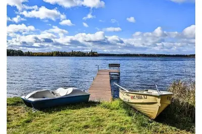 Image de Get Lost on Lost Lake in this cozy 3 bdrm home w/ firepit and dock.