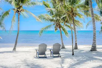 Beachfront paradise with private pool, ocean view, full kitchen, & shaded patio