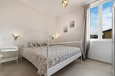 Image de Appartement de vacances '4 Passi Mare 2' avec balcons, climatisation et Wi-Fi.