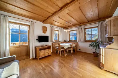 Image de Kalchgruberhof Appartement Enzian avec vue sur le lac, balcon privé, terrasse et Wi-Fi