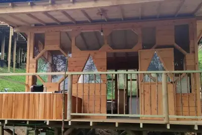 Image de Cabin with whirlpools 5 minutes from the airport