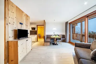 Image de Appartement de vacances familial \"Residence Kalchgruberhof Zirbe\" avec vue sur le lac et Wi-Fi.
