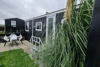 Image de Dream location sea view Wadden Sea 50m, Beach 300m Mobile Home Chalet TinyHouse