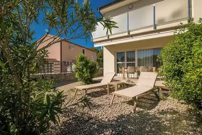 Image de Maison de vacances avec trois chambres