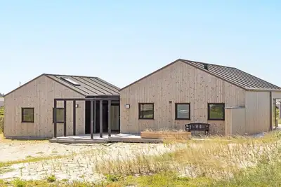 Image de Maison de vacances pour 8 a Løkken-By Traum