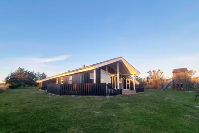 Image de Schönes Holzferienhaus in Strandnähe und mit Guter Ausstattung