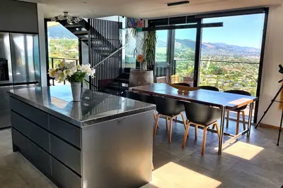 Stunning views, all-day sun, modern light filled home in a top Nelson area!