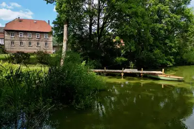 Image de Quiet vacation apartment with wood-burning stove, sauna, garden & terrace on historic estate. Castle courtyard