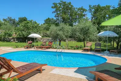 Image de Joli appartement pour 5 personnes avec climatisation, Wifi, piscine, Tv, terrasse et parking