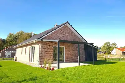 Image de Haus Küstenbrise - Top Ausgestattet und nur 700m vom Wattenmeer