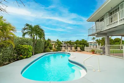 Image de One Particular Harbor ~ Waterfront Pool Home Near the Beach!