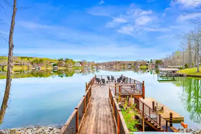 Image de Waterfront lake-view home with dock, fireplace, pool table, kayaks, & firepit