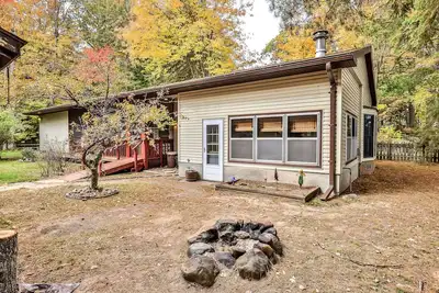 Image de Lakefront home with private dock, screened porch, woodstove, fast WiFi, & W/D