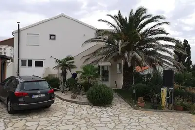 Image de Appartement de vacances Novalja pour 2 - 4 personnes avec 2 chambres à coucher - Maison mitoyenne
